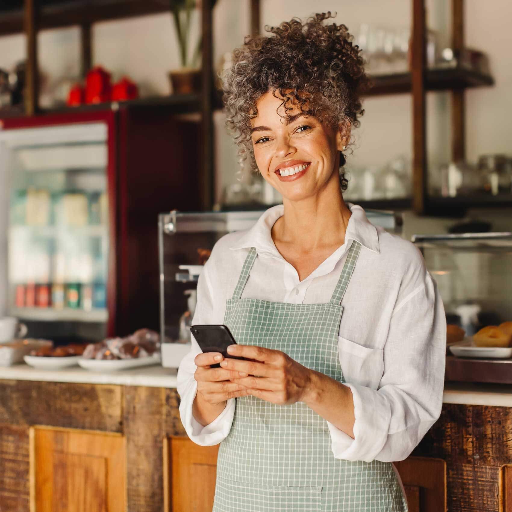 online bookkeeping services canada shopkeeper smiling